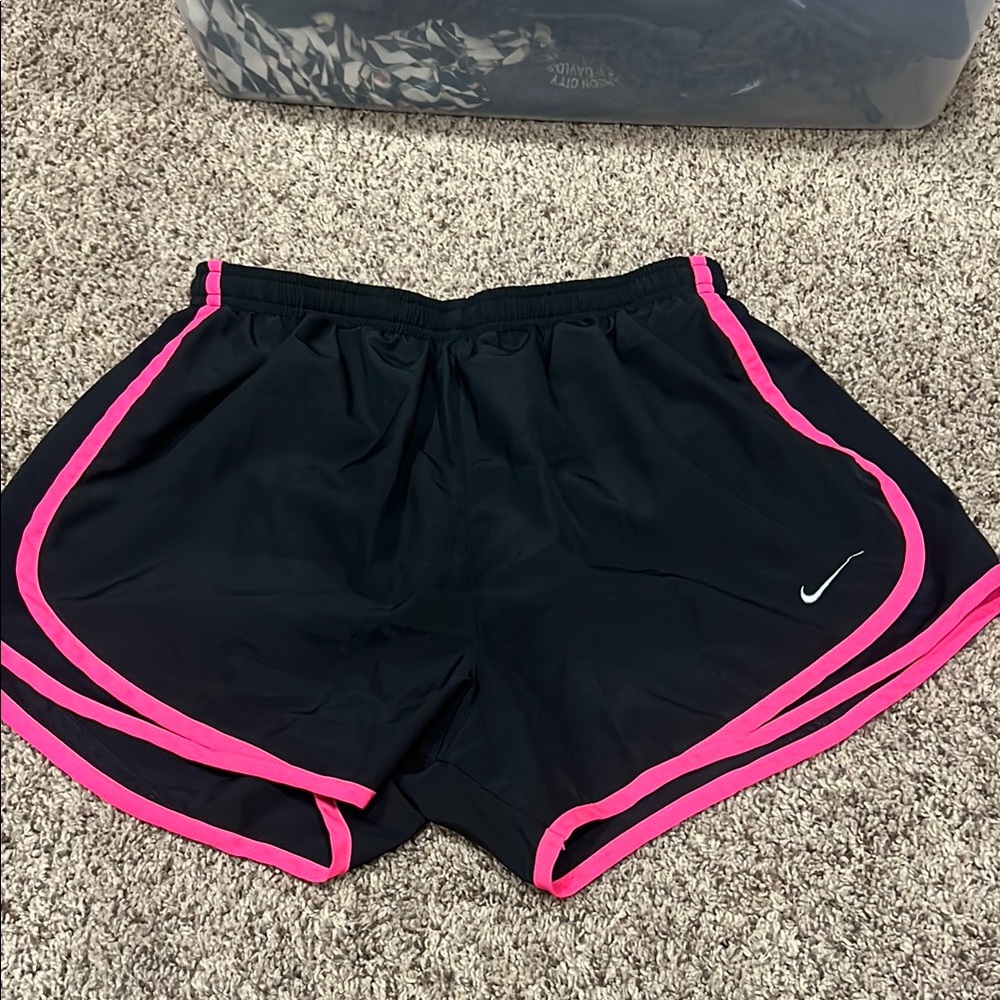 Nike Black and Pink Athletic Shorts with Curved Hem